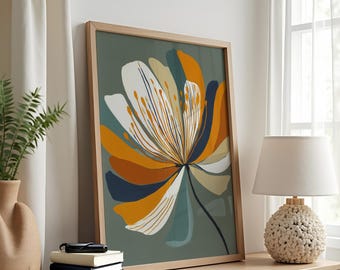 May include: A framed art print featuring a stylized floral design. The artwork showcases a large flower with petals in shades of white, orange, and navy blue against a muted green background. The frame is made of light-colored wood.