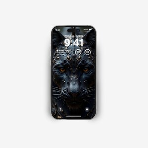 Puede incluir: Un tel&eacute;fono inteligente muestra una imagen de fondo de una pantera negra con detalles dorados en su rostro. La hora es 9:41 PM del mi&eacute;rcoles 7 de julio.