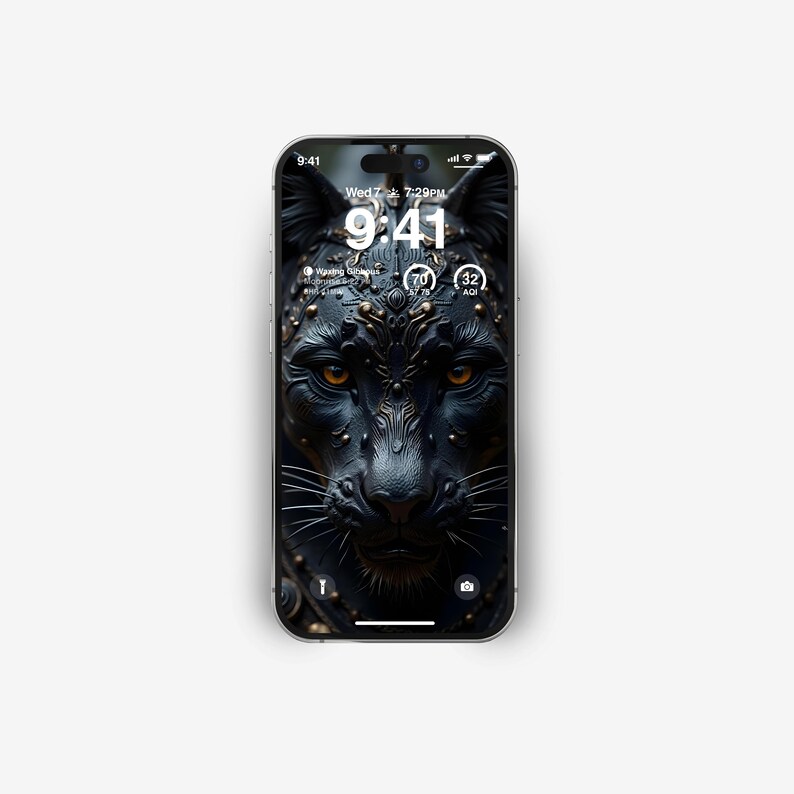 Puede incluir: Un tel&eacute;fono inteligente muestra una imagen de fondo de una pantera negra con detalles dorados en su rostro. La hora es 9:41 PM del mi&eacute;rcoles 7 de julio.