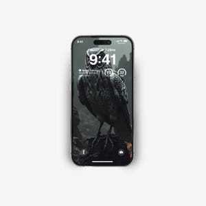 May include: A smartphone displaying a dark, moody image of an owl with a digital clock showing 9:41. The background is a dark forest with a blurred background.