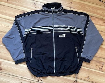 Giacca sportiva vintage Jako / Abbigliamento sportivo anni '90 / Giacca a vento nera e grigia / Taglia L