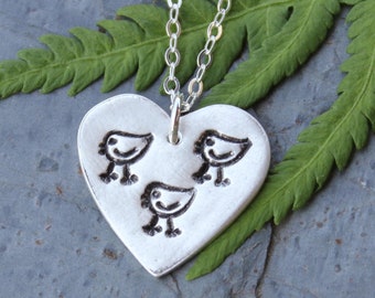 Three little chicks necklace - handmade fine silver heart charm with birds, on a sterling silver chain or leather cord - friends & family