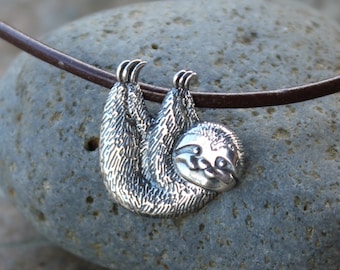 Tiny Happy Sloth Necklace- sterling silver charm on deep brown or green leather cord- other leather colors available