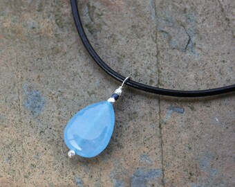 Aqua Chalcedony Quartz Teardrop Necklace - smooth light blue briolette drop hung on a black leather necklace with sterling silver accents