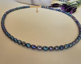 Set zwarte zoetwaterparelketting, iriserende pauwenparels, klassiek en lang ontwerp, variaties afstandkraal