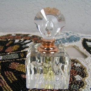 Vintage 80s Oleg Cassini Perfume Bottle with some Perfume
