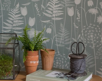 Charlotte&#39;s Garden wallpaper in &#39;heath&#39; by Hannah Nunn, a green floral, botanical wall covering inspired by the Bronte sisters garden