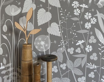 SAMPLE Hedgerow wallpaper in 'pipit' by Hannah Nunn, a warm brown botanical wall covering with a wild tangle of plants and flowers