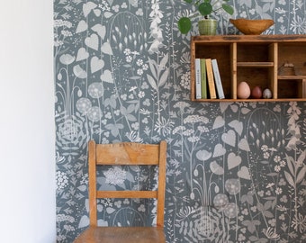 SAMPLE Hedgerow wallpaper in 'furling' by Hannah Nunn, a blue/green botanical wall covering with a wild tangle of plants and flowers