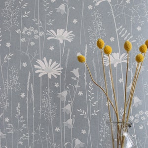 SAMPLE Daisy Meadow wallpaper in 'moonrise' by Hannah Nunn, a dusky blue, floral meadow wall covering with daisies, harebells and grasses