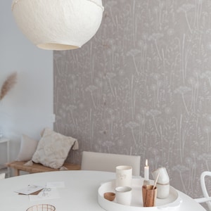 Paper Meadow wallpaper in 'mallow' by Hannah Nunn, a grey/pink, botanical wall covering with meadow seed heads and grasses