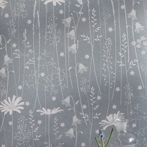 Daisy Meadow wallpaper in 'moonrise' by Hannah Nunn, a dusky blue wall covering with a summer meadow print of daisies, harebells and grasses image 3