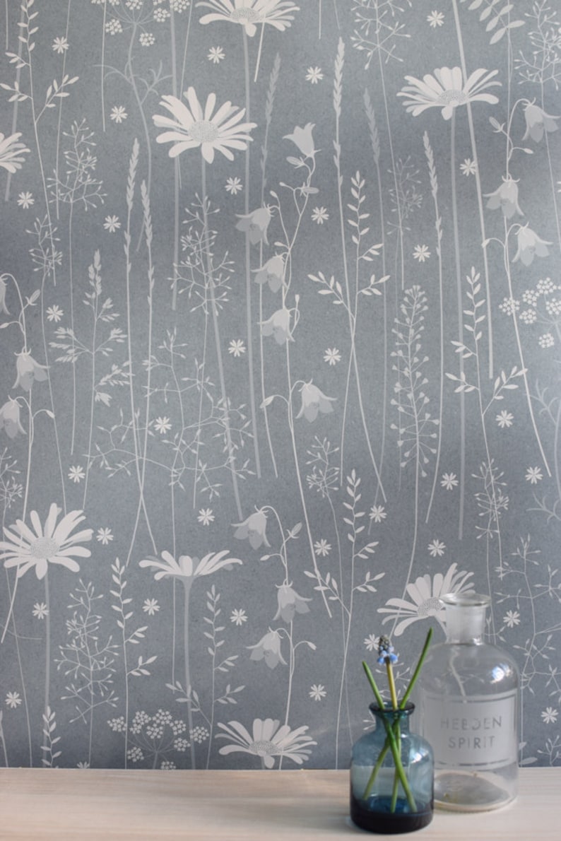Daisy Meadow wallpaper in 'moonrise' by Hannah Nunn, a dusky blue wall covering with a summer meadow print of daisies, harebells and grasses image 3