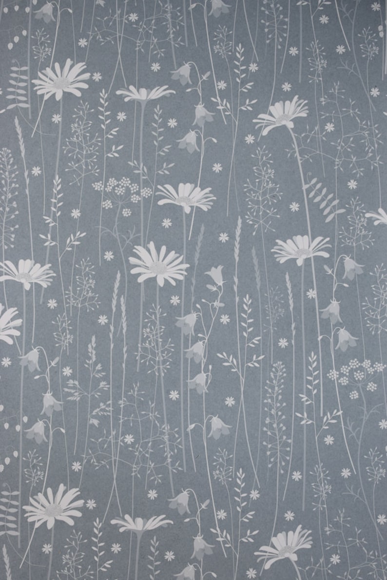 Daisy Meadow wallpaper in 'moonrise' by Hannah Nunn, a dusky blue wall covering with a summer meadow print of daisies, harebells and grasses image 5