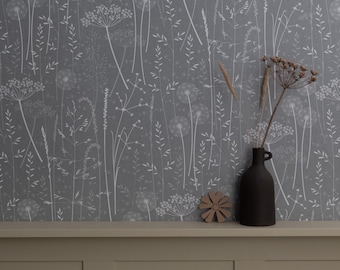Paper Meadow in &#39;Charcoal&#39; by Hannah Nunn, a dark grey botanical wall covering with meadow seed heads and grasses