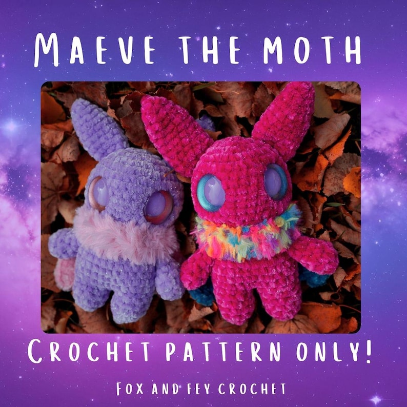 May include: Two crocheted moth plushies, one purple and one pink, with large eyes and fuzzy details. The plushies are sitting on a bed of autumn leaves. The text "Maeve the Moth Crochet Pattern Only! Fox and Fey Crochet" is displayed below the plushies.