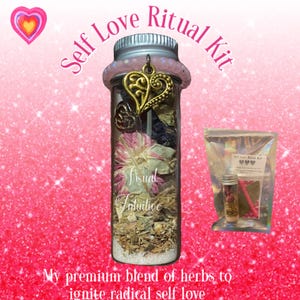 May include: A clear glass vial filled with dried herbs, flower petals, and a gold-toned heart charm attached to the silver screw-top lid. The vial is labeled Self Love Ritual Kit and is accompanied by a small, transparent pouch containing a similar vial.