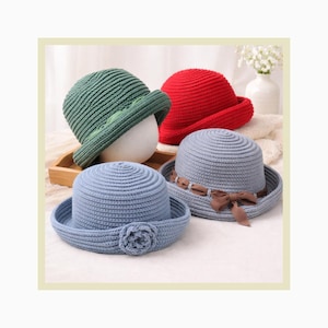 May include: A set of three ceramic mugs with a speckled, matte finish. Each mug features a different color: light blue, cream, and gray. The mugs have a simple, modern design and a comfortable handle.