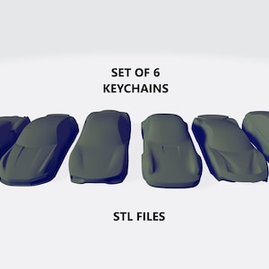 Może przedstawiać: Zestaw sześciu plików STL z 3D-wydrukowanymi brelokami do kluczy w kształcie samochodów. Breloki są szare i przedstawiają różne modele samochodów.
