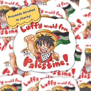 May include: A sticker featuring a cartoon character in a straw hat, holding a flag with the colors of the Palestinian flag. The text "Luffy would free Palestine!" is written in red. The sticker also includes the text "Proceeds donated to charity!"