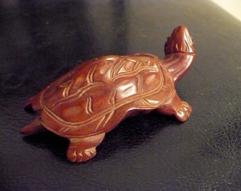 Hand carved small wooden turtle