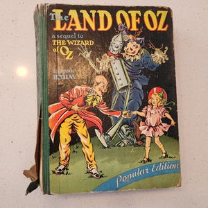 A Terra de Oz Uma continuação de O Mágico de Oz, de L. Frank Baum, 1939