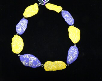 Clay necklace with sterling silver and 18k gold-leaf