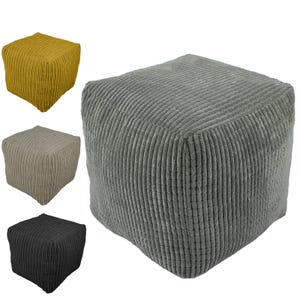 May include: Four square-shaped, fabric-covered footstools in different colours. The footstools are made of a textured, corduroy-like fabric. The colours are mustard yellow, light grey, black, and dark grey.
