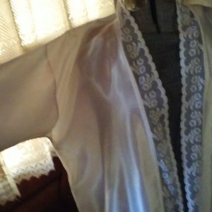White Satin Bed Jacket with Lace Edges Kimono style open front. Everyone needs a night in white satin once in a while.