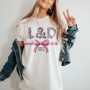 Coquette Labor and Delivery Nurse T-Shirt, Cute Pastel Medical Worker Tee, Girly L&D Nurse Aesthetic Graphic, Soft Nurse Squad Top, Feminine