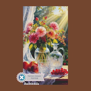 May include: A still life painting featuring a bouquet of pink and orange flowers in a clear vase, alongside a crystal decanter, glass, and red grapes. Peaches are arranged on a table with a lace cloth. The text "Pattern Keeper TESTED" and "BeeStitchUa" are visible.