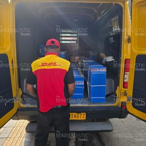 May include: A yellow DHL delivery van with its doors open, revealing packages inside. A person wearing a DHL uniform stands in front of the van. The van has a license plate with the number T4077.