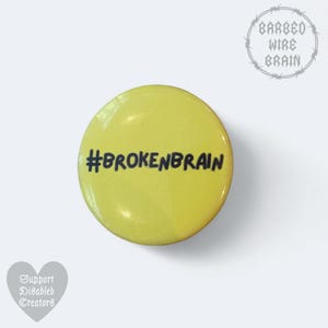Broken brain badge