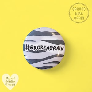 Broken brain badge