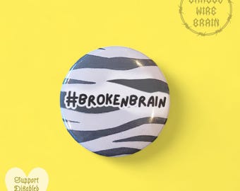 Broken brain badge