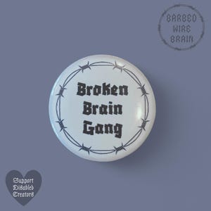 Broken brain gang barbed wire badge