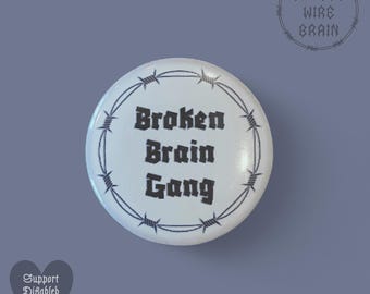 Broken brain gang barbed wire badge