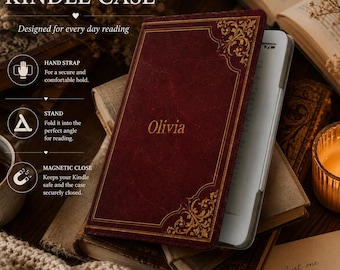 May include: A deep red Kindle case featuring gold-colored filigree corner accents and the name Olivia printed in gold. The case includes a hand strap, a foldable stand, and a magnetic closure mechanism to keep the e-reader secure while reading.