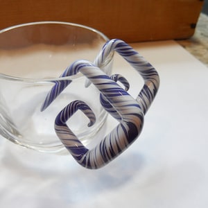 Glass gauges, 00g, blue and white, angled glass spiral, 00 gauge