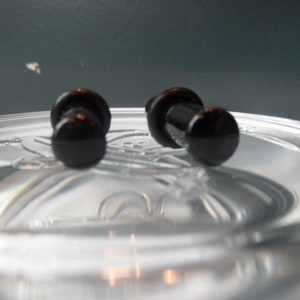 Glass gauges, 4g black plugs, size 4 gauge