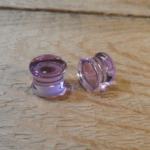 Glass gauges, 7/16 inch plug, transparent purple glass plug