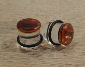 Glass plugs 9/16 inch amber and clear glass plugs 9/16 gauge