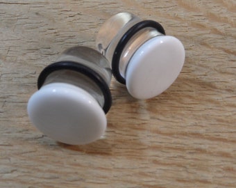 Glass plugs 9/16 inch white and clear glass plugs 9/16 gauge