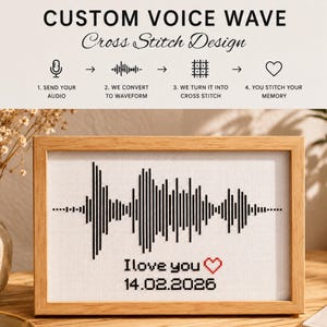 Puede incluir: Un diseño de punto de cruz enmarcado con una forma de onda de audio en blanco y negro. El texto "I love you" y la fecha 14.02.2026 están bordados debajo. El marco es de madera clara.