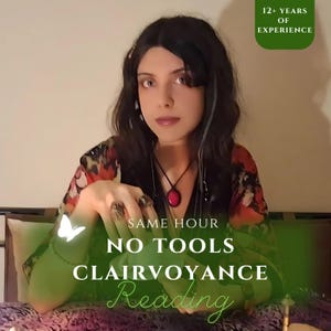 May include: A woman with long dark hair sits in front of a green background with the text "SAME HOUR NO TOOLS CLAIRVOYANCE Reading". She is wearing a red and black patterned top and a necklace with a red stone pendant. She has rings on her fingers.