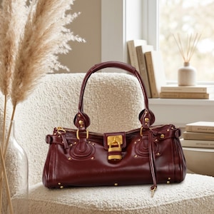 Trendy Y2K aesthetic slouchy blue handbag, soft faux leather luxury inspired look