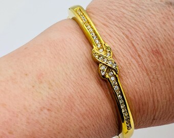 Vintage Goldtone Love Knot Rhinestone CZ Hinged Bangle Bracelet Signed Roman