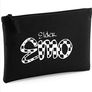 May include: Black zippered pouch with the words "Elder Emo" in white. The word "Emo" is stylized with a checkerboard pattern. The pouch has a rectangular shape and a zipper closure.