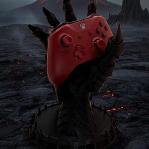 Mano de Sauron para sostener el controlador