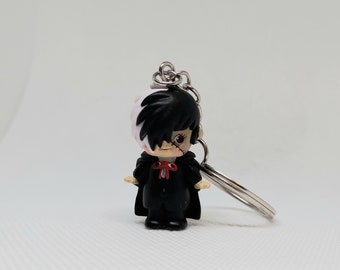 Llavero de Doctor Black Jack, muñeco Kwepie